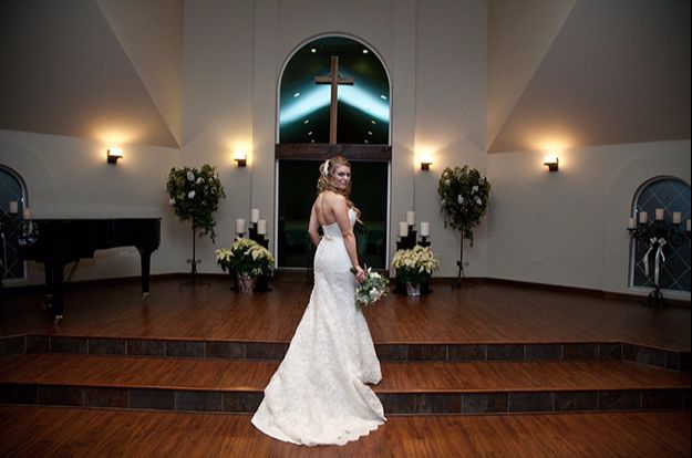 Bride at the steps inside our wedding chapel in Littleton, Colorado