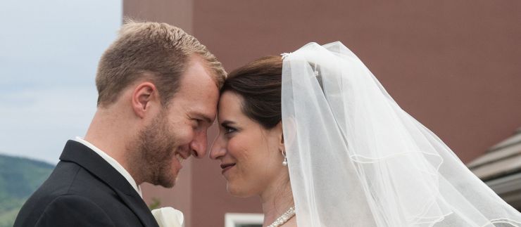 Groom and Bride outside wedding chapel 